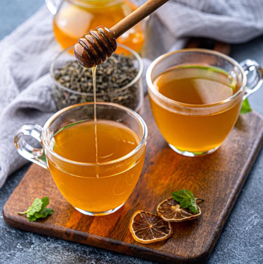 ホテル ハイアット リージェンシー テサロニキ テッサロニキ エクステリア 写真 Honey being drizzled into a cup of tea